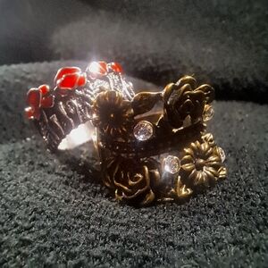 Two modern rings. Bronze is adjustable. Gun metal is about a size 6